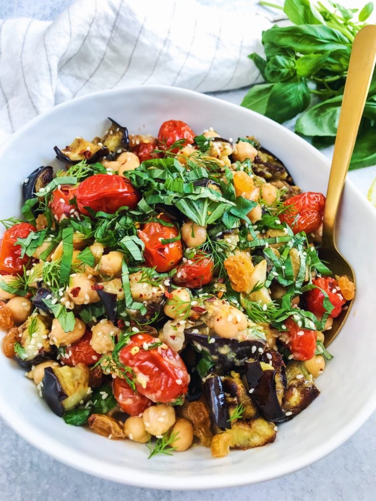 chickpea and roasted vegetable salad with golden raisins and fresh herbs