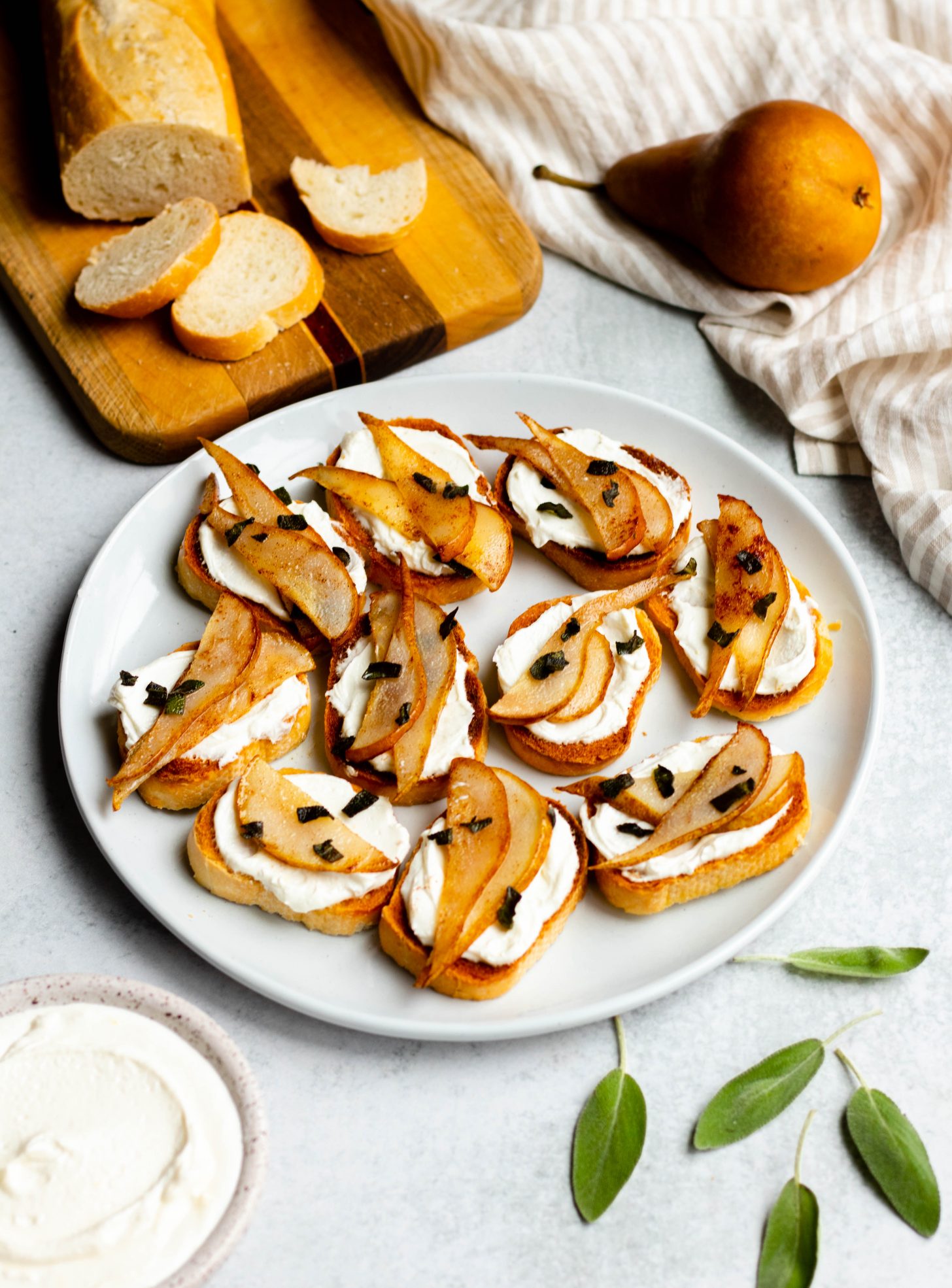 Pear Crostini with Whipped Goat Cheese and Sage • Daisybeet