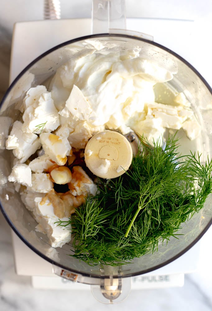 feta dill dressing ingredients in a food processor bowl before being blended together