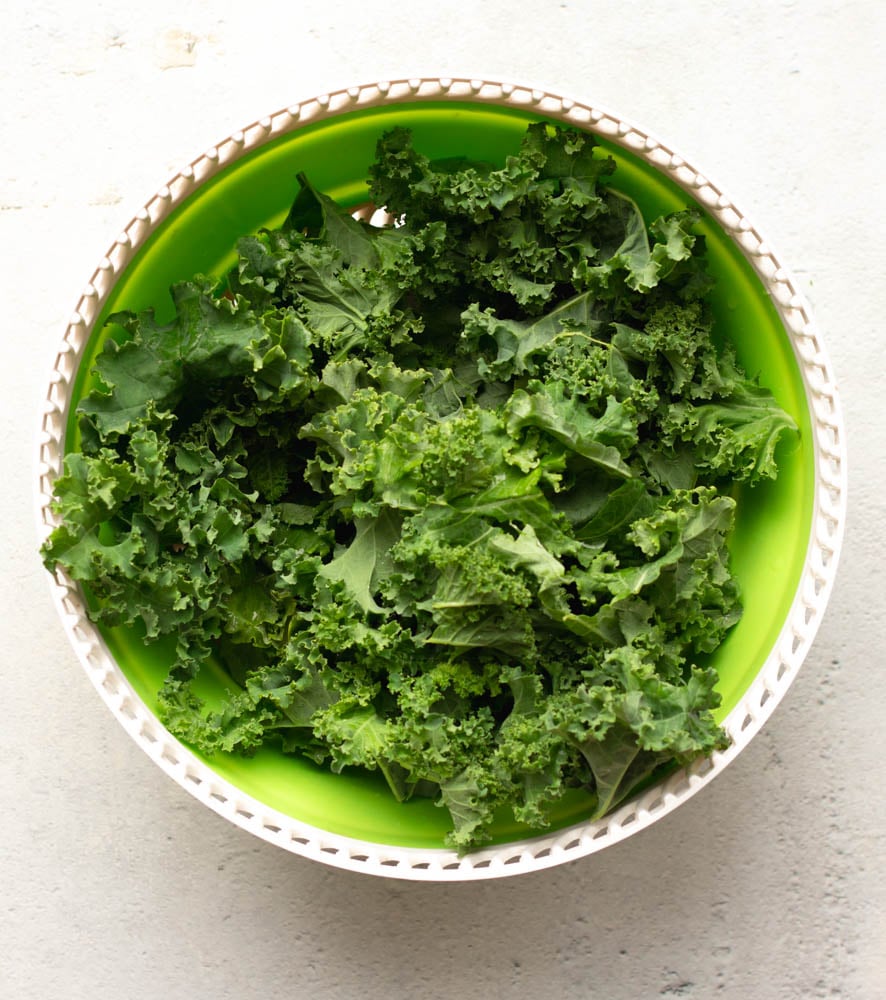 kale leaves in a salad spinner
