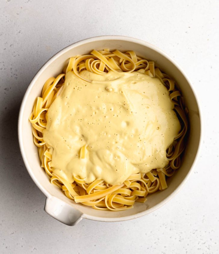 bowl of fettuccine with vegan alfredo sauce 