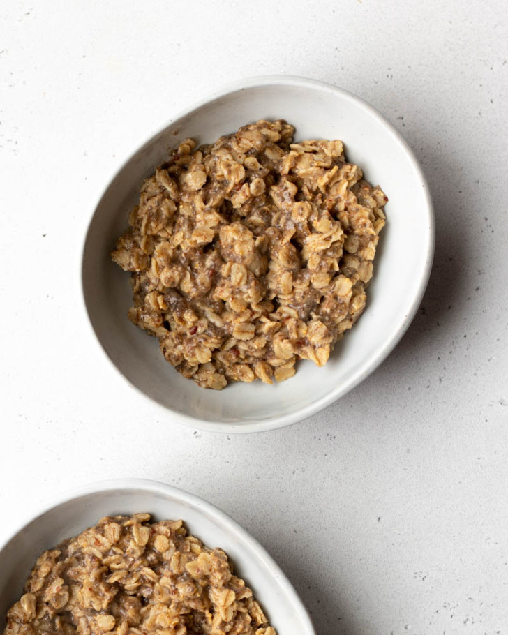 Two oval bowls of oatmeal