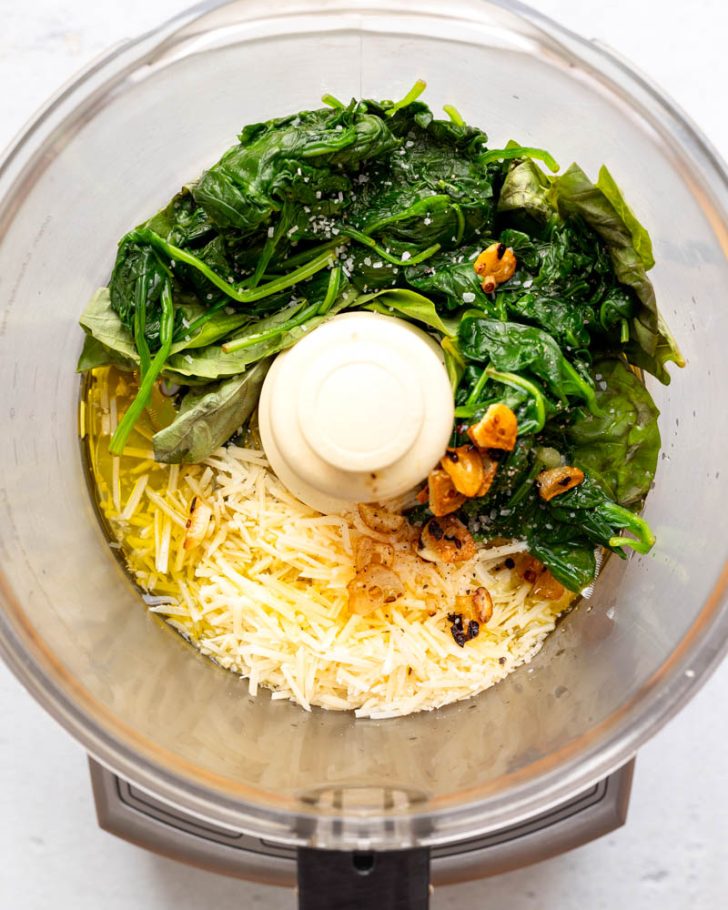 green sauce for pasta ingredients in a food processor before being blended together