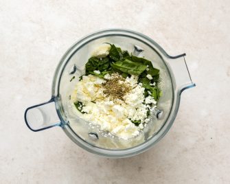 spinach and feta cheese in a blender