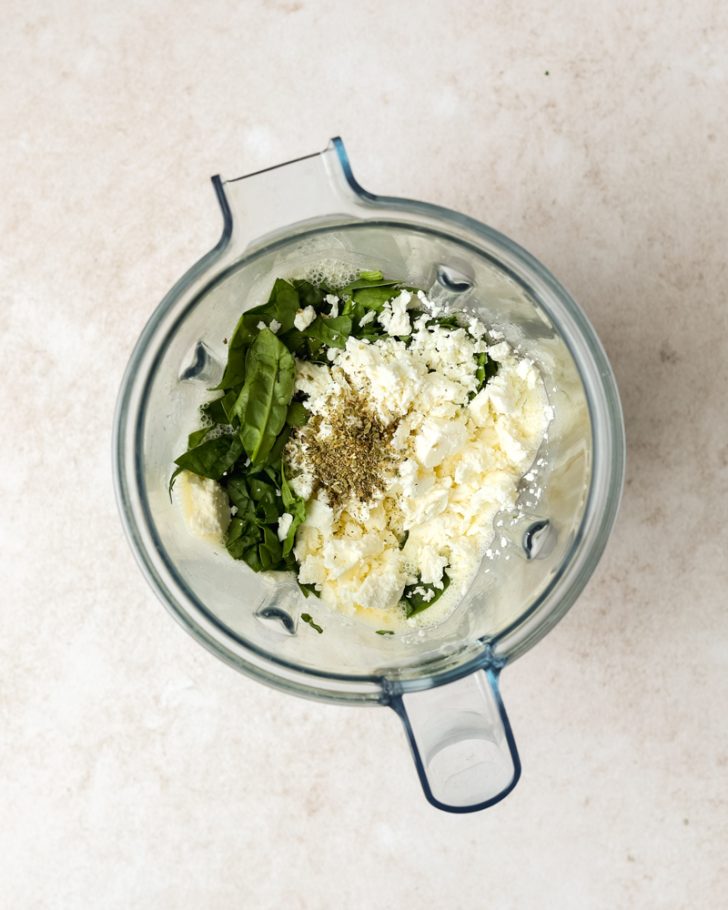 spinach and feta cheese in a blender 