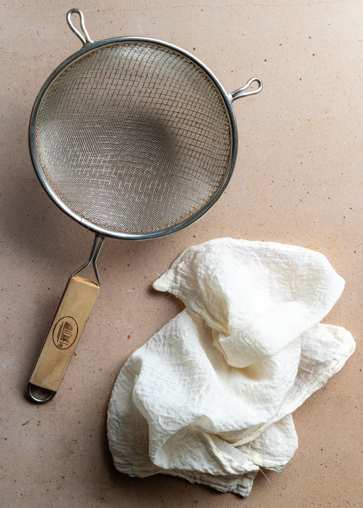 a fine mesh strainer and cheesecloth