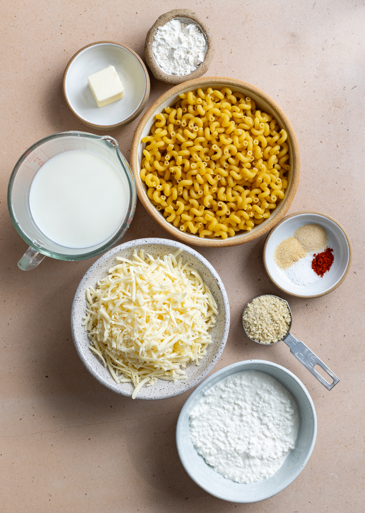 cottage cheese mac and cheese ingredients measured out in bowls