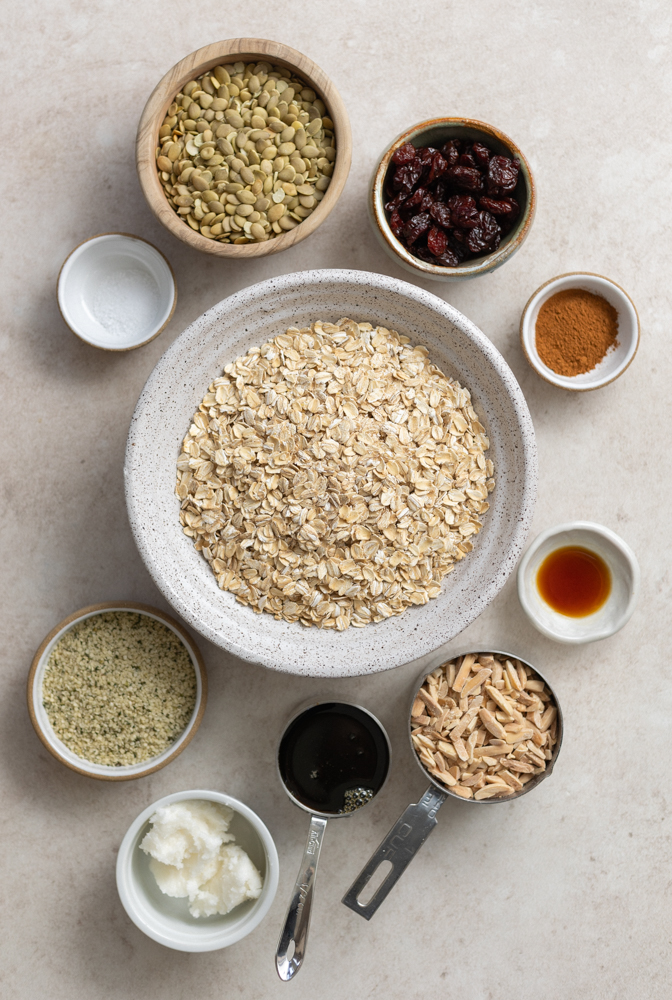 protein granola ingredients measured out in small cups