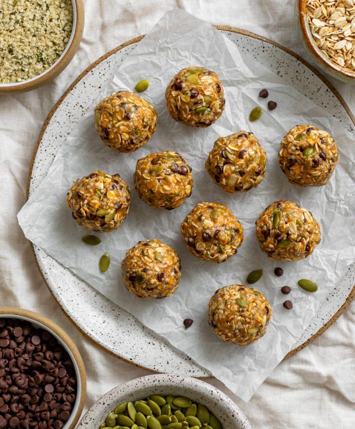 plate with no bake energy balls surrounded by little bowls of ingredients
